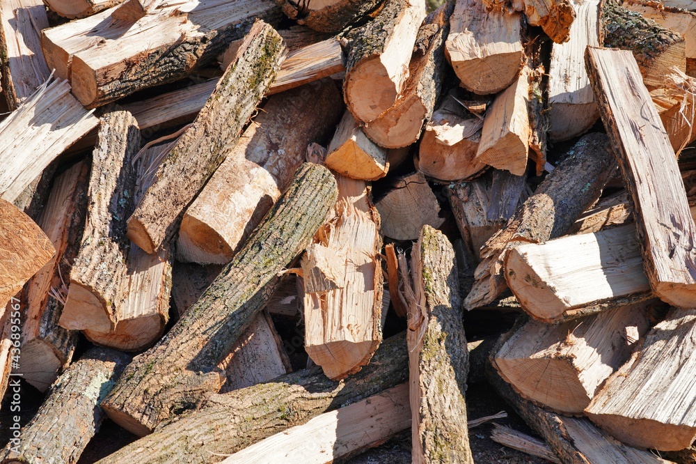 Stacks of chopped fire wood logs outside for sale Stacks of chopped fire wood logs outside for sale