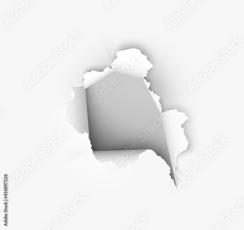 ragged Hole torn in ripped paper on background