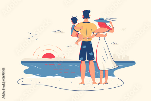 Family enjoy ocean view on beach