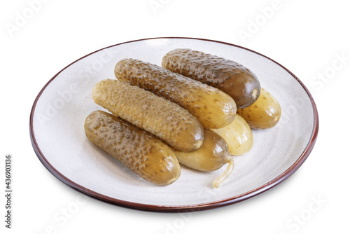 Pickled cucumbers with dill and garlic slices on a white isolated background