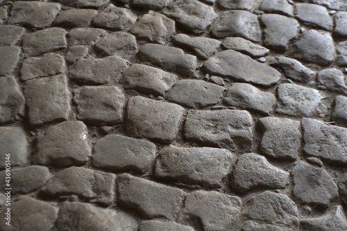 Stone Pavement. Granite Cobble Stoned Pavement Background