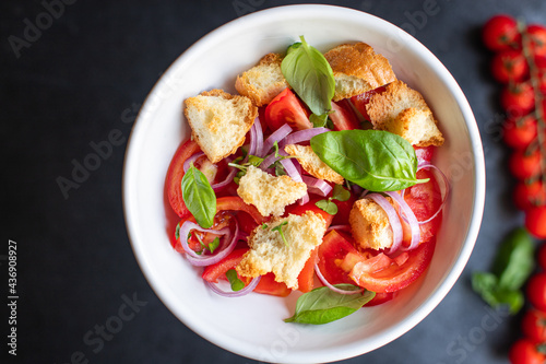 tomato vegetable salad panzanella veggie croutons, olive oil, rusk healthy food meal snack copy space food background  vegan vegetarian food