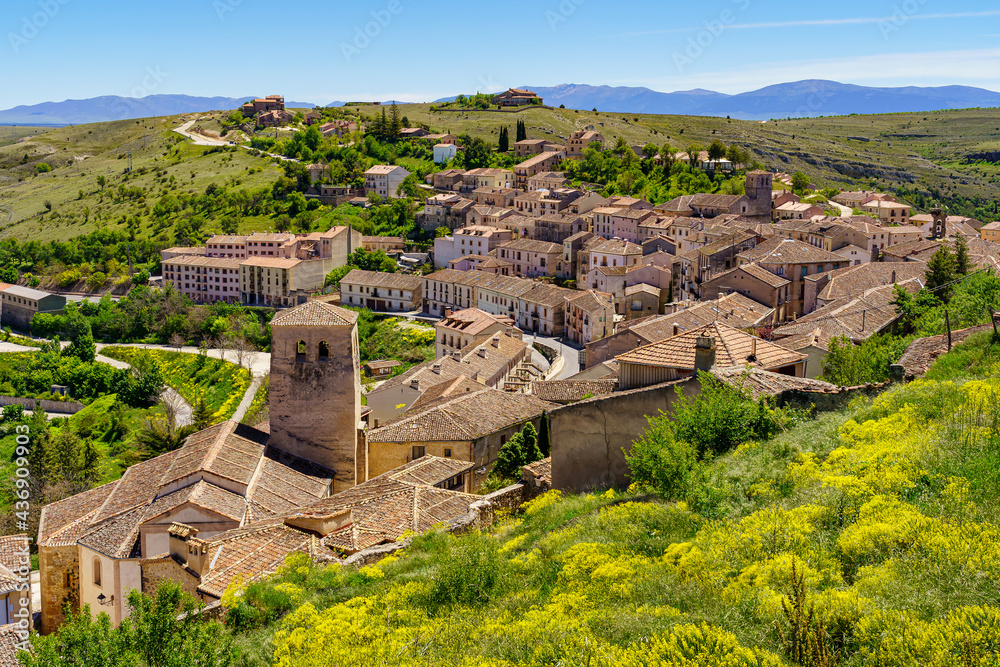 Aerial view of an old medieval town with its roofs and church towers. Sepulveda Segovia.