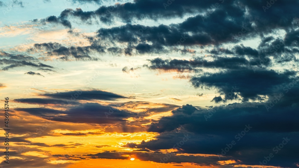 Fototapeta premium colorful sky with sun in clouds of altitude . religious background sunset or dawn , 
