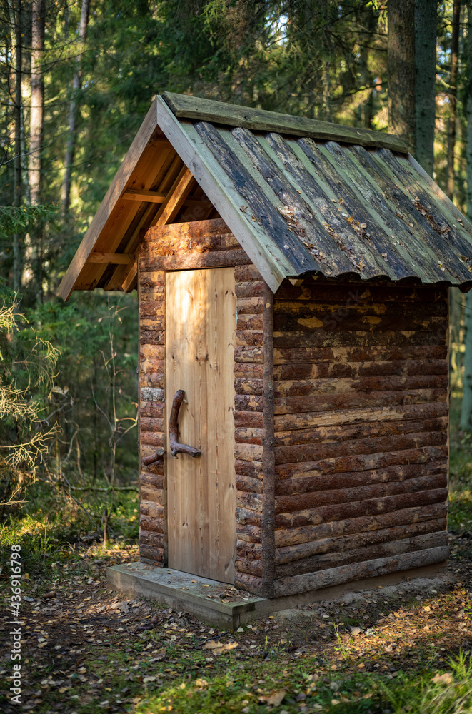 small wooden toilet house in the forest woods small wooden toilet house in the forest woods