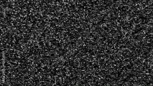 Video error. Abstract noise of analog television. Digital glitch. Damage to the video signal with pixel noise and noise.