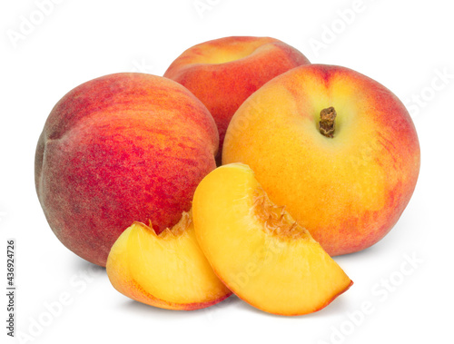 Ripe sweet peaches and slices isolated on white background. Fresh fruits.