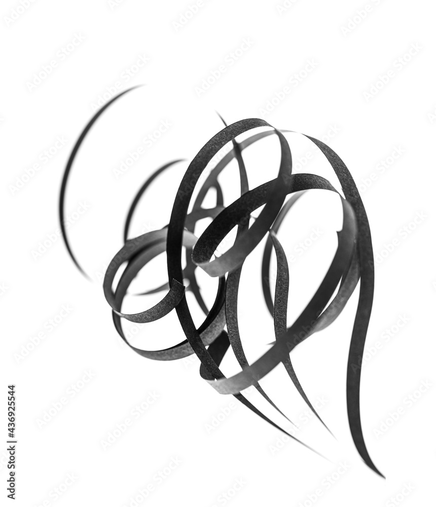 A curled black paper ribbons. Abstract artistic patterns. Design concept. Ready solutions for interior design office. Macro lens close up shot 1:1. Monochrome image. A curled black paper ribbons. Abstract artistic patterns. Design concept. Ready solutions for interior design office. Macro lens close up shot 1:1. Monochrome image.