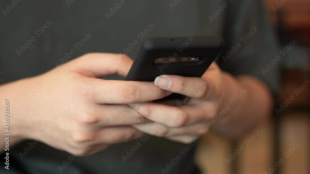 slow motion scene on man hand using smartphone to searching on website or read content social media application for leisure lifestyle and technology concept slow motion scene on man hand using smartphone to searching on website or read content social media application for leisure lifestyle and technology concept