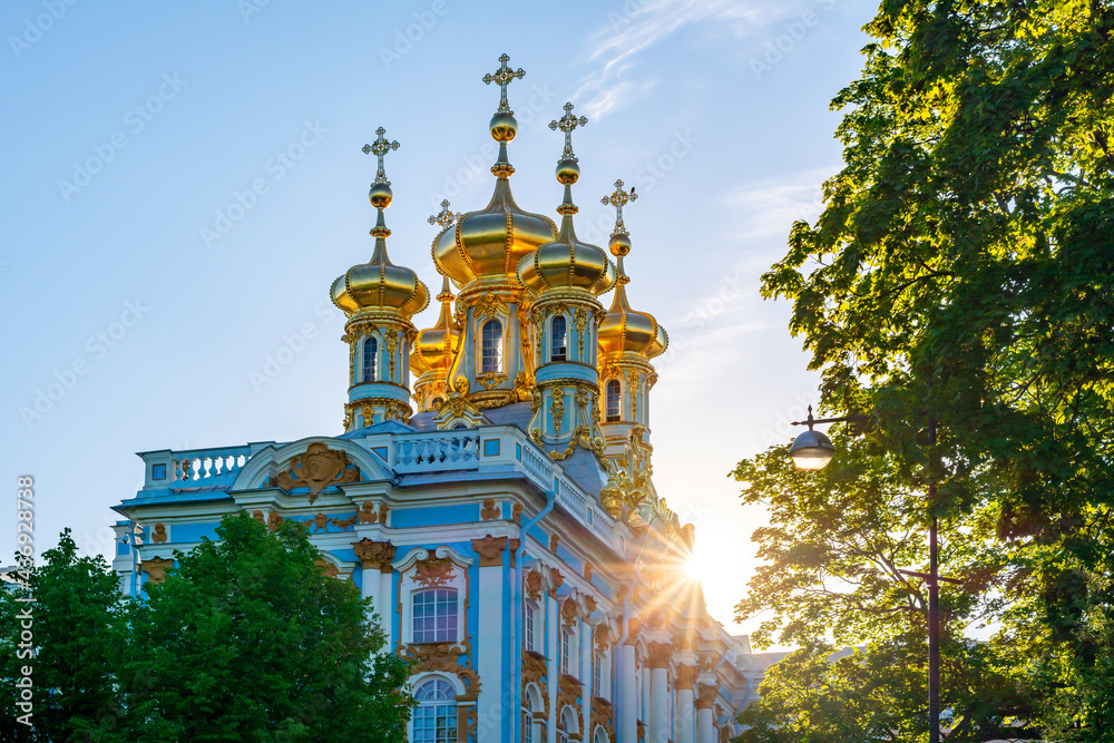 Resurrection church dome of Catherine palace in Tsarskoe Selo (Pushkin) at sunset, Saint Petersburg, Russia