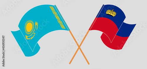 Crossed and waving flags of Kazakhstan and Liechtenstein