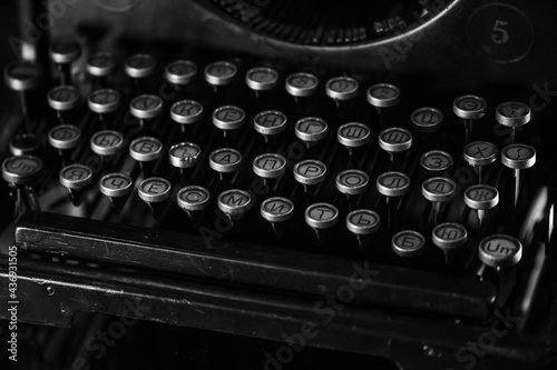 detail of an old printing press, in vintage colors