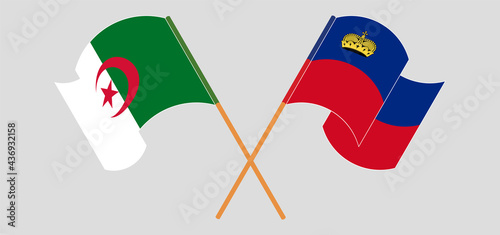 Crossed and waving flags of Algeria and Liechtenstein