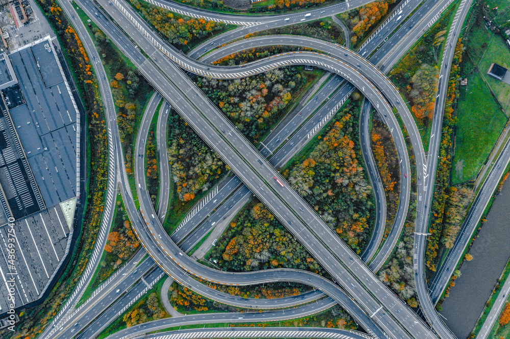 Aerial view of round interchange during autumn in Ghent, Belgium. Aerial view of round interchange during autumn in Ghent, Belgium.