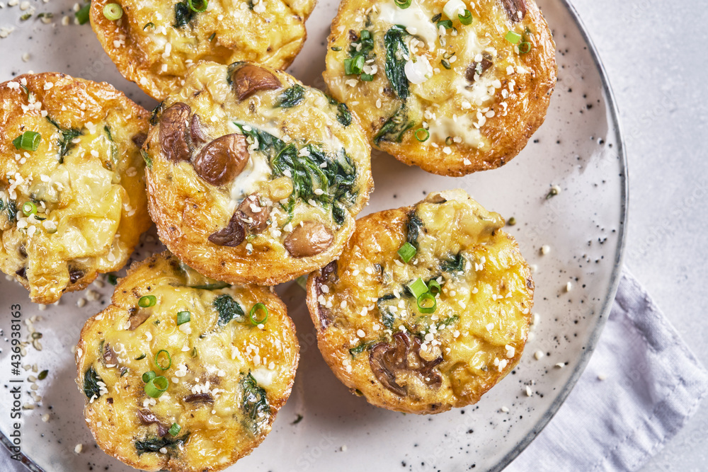 Vegetarian egg muffins with mushroom, spinach and cheese for Breakfast