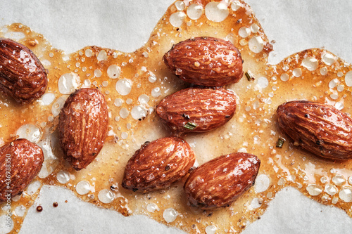 background made with caramelized almonds with honey and sugar photo