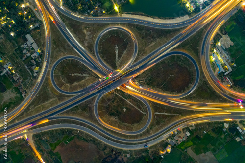 Aerial view of a large road intersection along the highway in countryside near Bhanga, Dhaka state, Bangladesh. photo