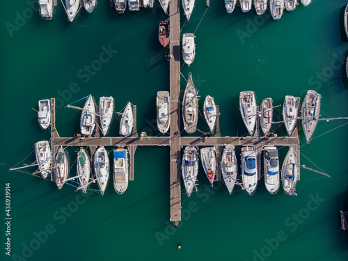 Aerial view of Fecamp Harbour with boats anchored at the pier, Seine-Maritime, France. photo