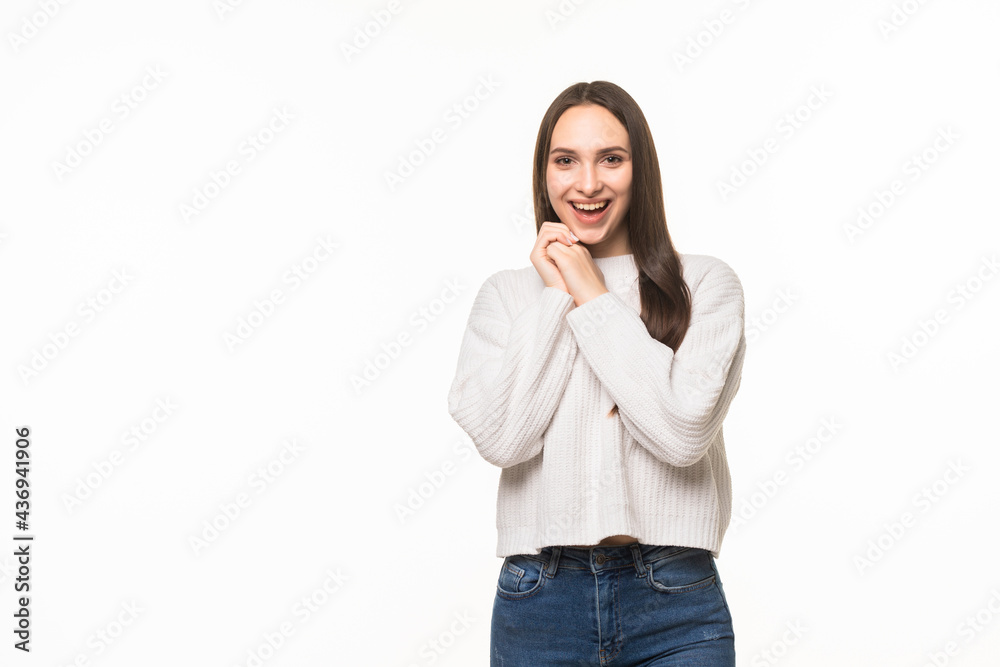 Pleased woman reclines on her hands and looking at the camera over white background Pleased woman reclines on her hands and looking at the camera over white background