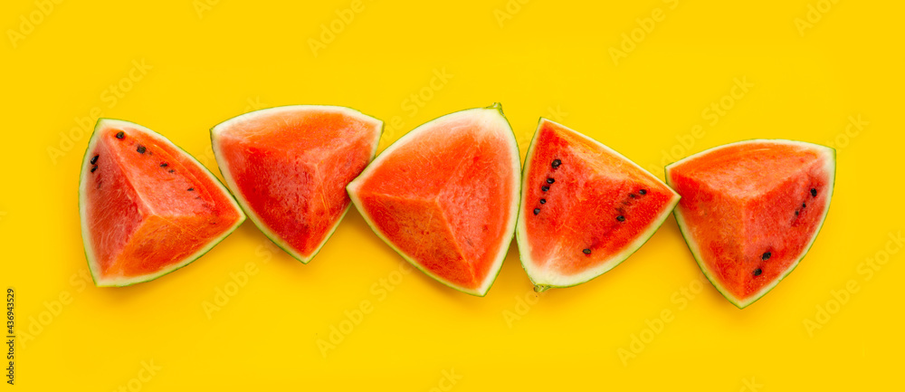 Watermelon on yellow background. Top view Watermelon on yellow background. Top view