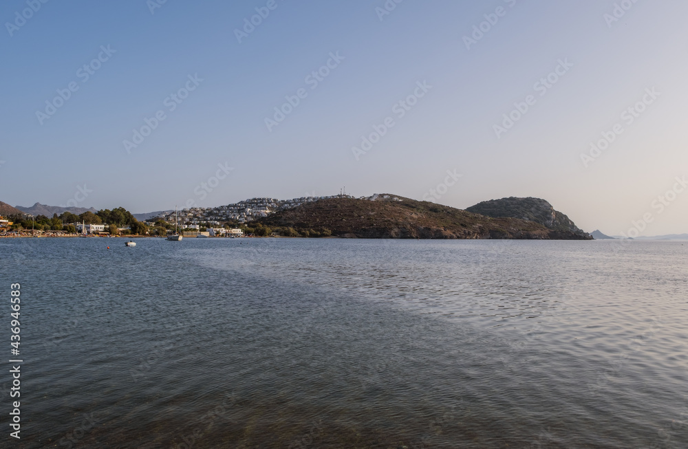 Gumusluk, a seaside village and fishing port in Bodrum, Mugla Province, southwestern Turkey.The other name is Myndos ancient city. October 2020