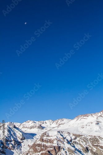 Mountain top on a clear blue sky