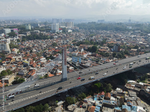 Aerial shoot of Pasupati Bridge, landmark and icon of Bandung City, capital of West Java Province, Indonesia.  photo