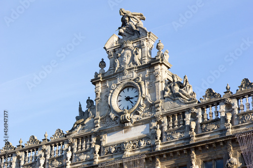 Valenciennes, France, 2017/01/05. The clock and statues on the town hall. photo