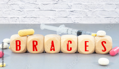 BRACE word made with building blocks, medical concept