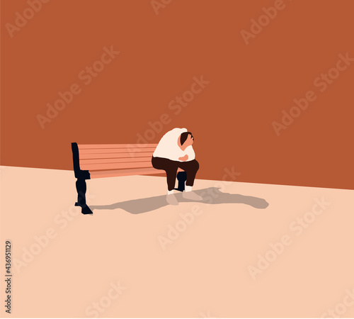Man sitting with his head in his hand sitting outside after being fired from his last job. Negative human emotion facial expression feelings.