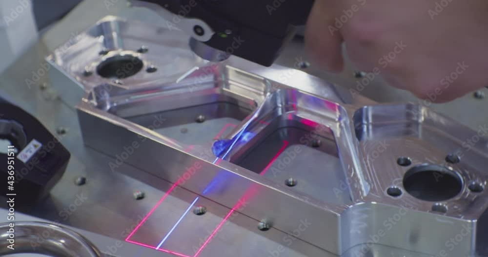 Modern science and technology. Business concept.A modern electronic device measures a complex part located in a special chamber in a non-contact manner using a laser beam.close-up.