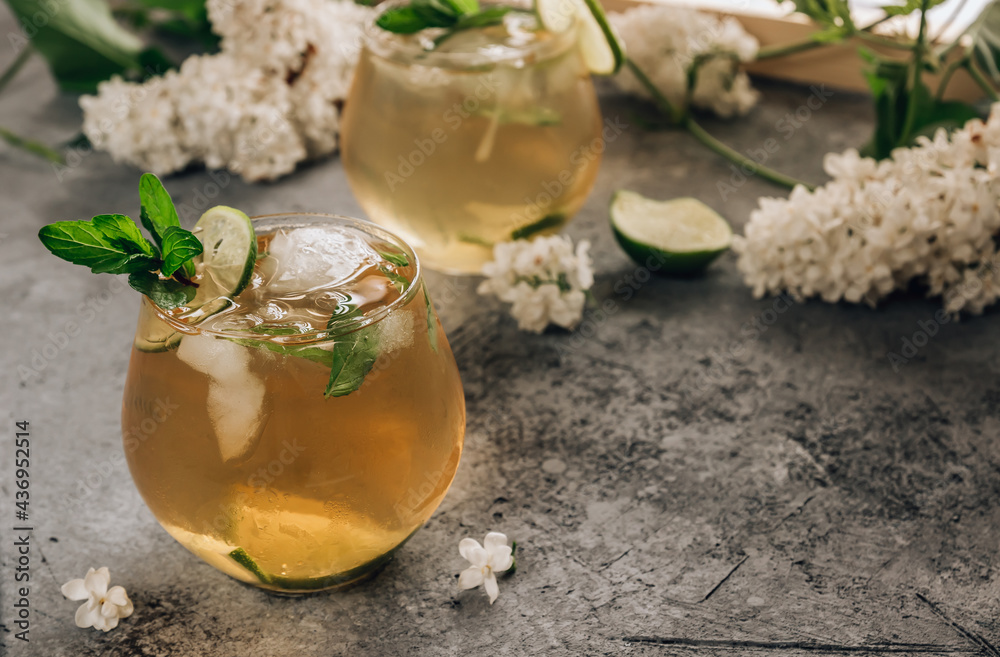 Ice green tea with lime and mint. Summer refreshment drink. Selective focus. Place for text