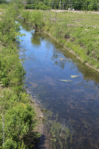 West Fork of the North Branch of the Chicago River on a sunny day at Somme Prairie Nature Preserve in Northbrook, Illinois