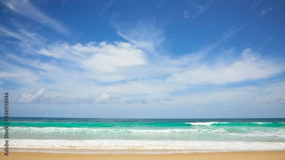 Phuket tropical beach in Thailand Wave on sand beach and beautiful sky Summer season on sunny day horizon and cloud visible Sea with turquoise water waves gushed towards shore and bubble covered sand Phuket tropical beach in Thailand Wave on sand beach and beautiful sky Summer season on sunny day horizon and cloud visible Sea with turquoise water waves gushed towards shore and bubble covered sand