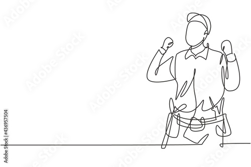 Single one line drawing handyman with celebrate gesture ready to work on repairing the damaged part of house. Professional work concept. Modern continuous line draw design graphic vector illustration
