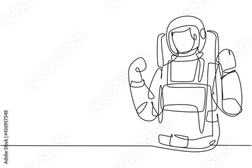 Single continuous line drawing astronaut with celebrate gesture wearing spacesuits to explore outer space in search mysteries of universe. Dynamic one line draw graphic design vector illustration