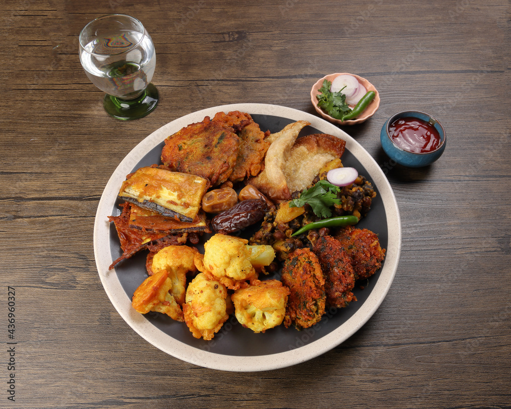 Indian Bengali stye variety fitter deep fried tanpura piaju pakoda