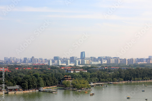 Beijing Summer Palace and modern urban landscape in the distance  China
