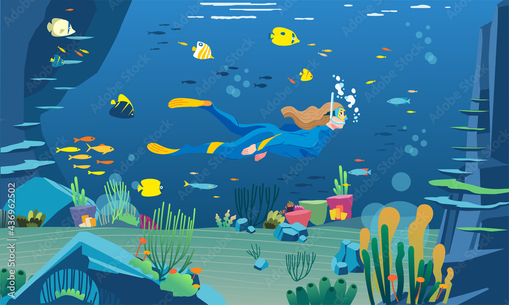 Fototapeta premium a female diver is snorkelling in the sea with a very beautiful sea view. lots of coral reefs, fish and sea plants