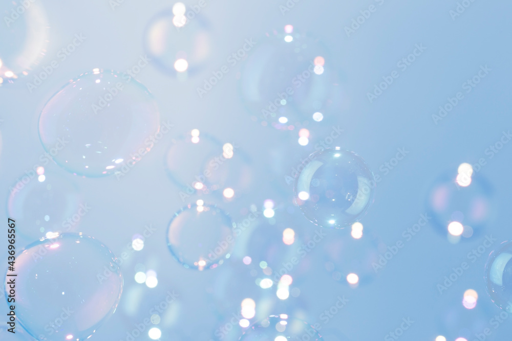 Freshness Natural with Transparent  Soap Bubbles Float on Blue Background.
