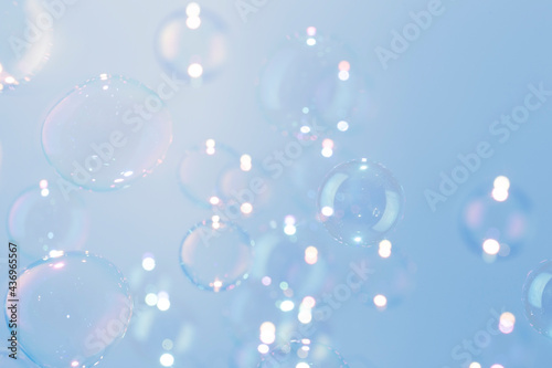 Freshness Natural with Transparent Soap Bubbles Float on Blue Background.