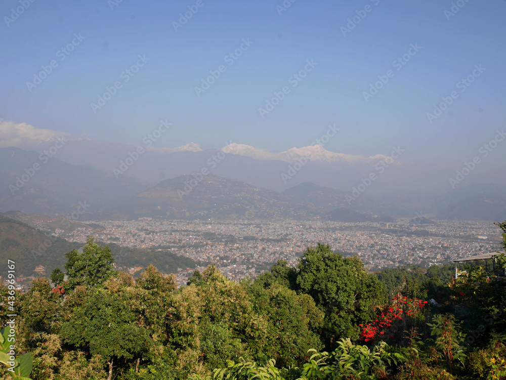 Aerial view landscape fewa lake and himalayan range with cityscape Pokhara hill valley village city of capital of Gandaki Pradesh for nepali people and foreign travelers travel visit in Pokhara, Nepal