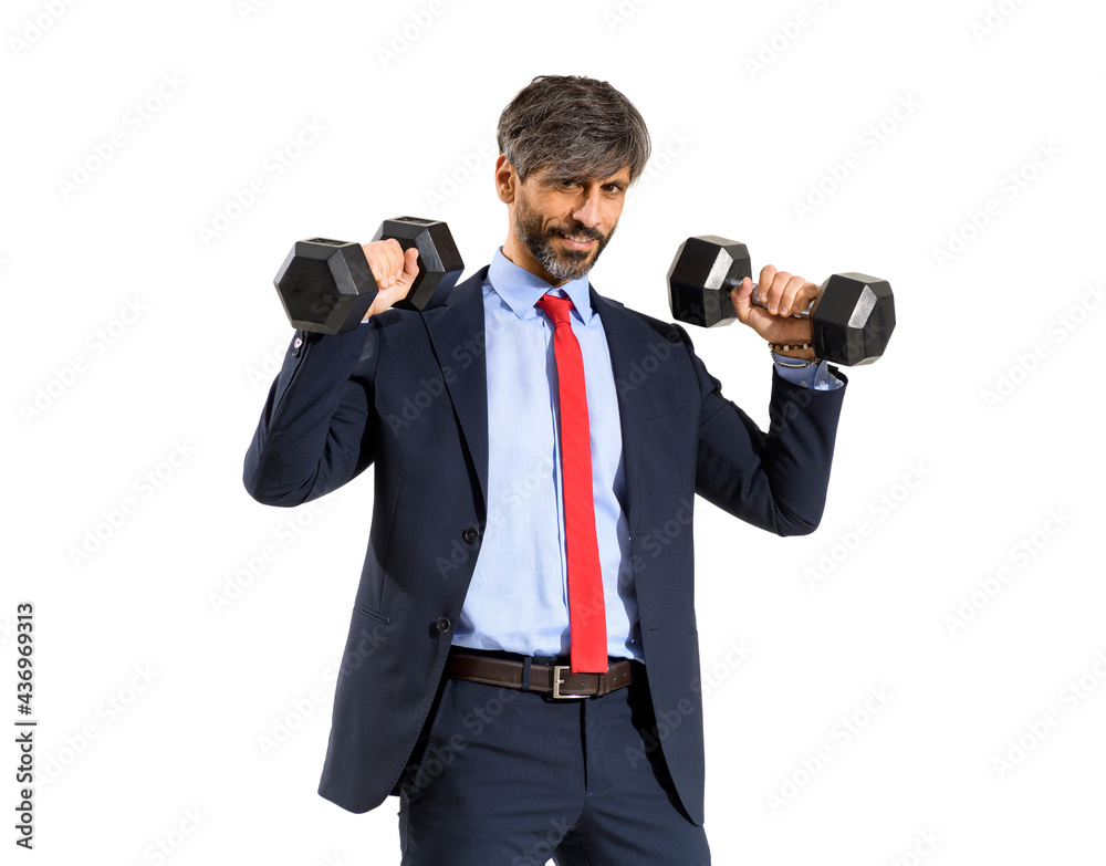 Stylish fit businessman in suit working out with weights Stylish fit businessman in suit working out with weights