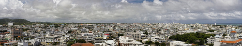 Okinawa,Japan - May 21, 2021: Panoramic view of Ishigaki City, Okinawa, Japan, from Ishigaki port  © Khun Ta