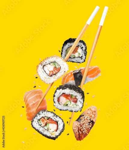 Composition with different sushi rolls on white background