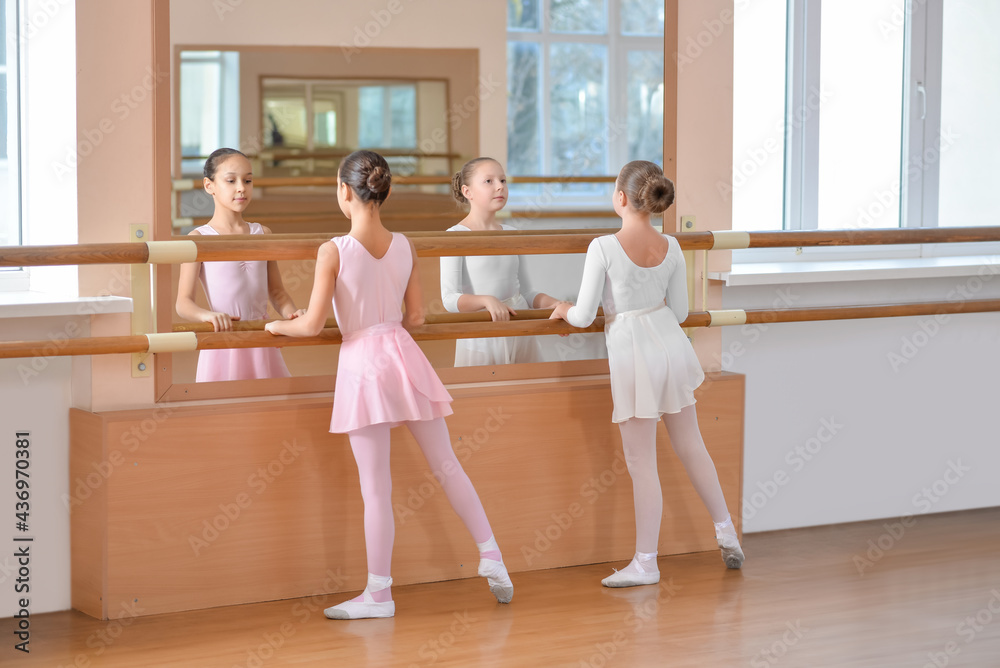 Little ballerinas training in dance studio Little ballerinas training in dance studio