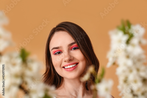 Beautiful young woman with ...