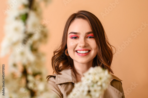 Beautiful young woman with ...