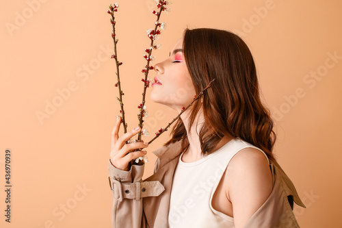 Beautiful young woman with ...