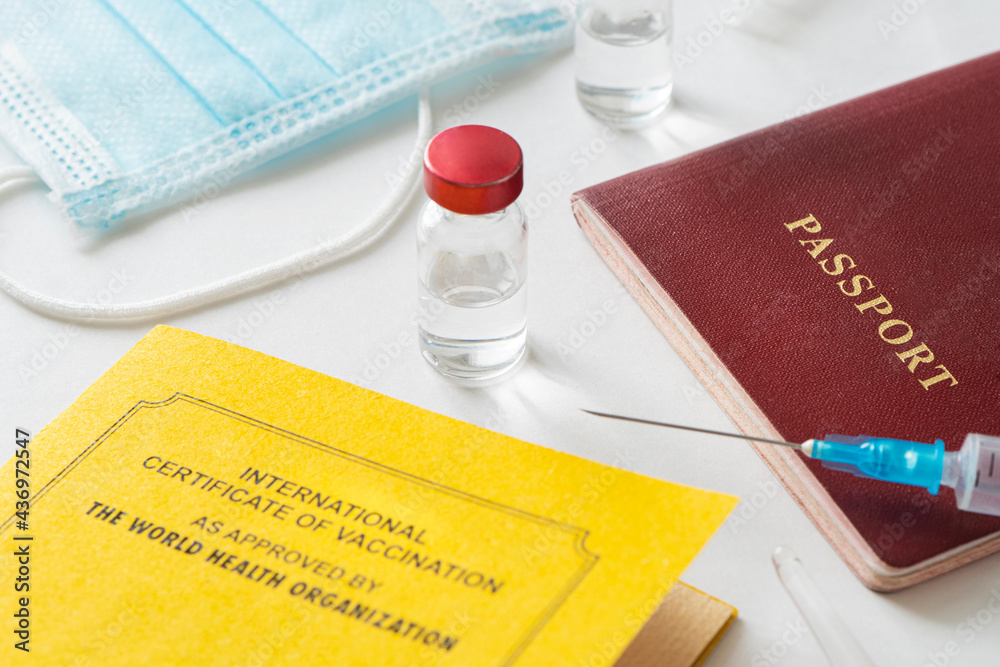 Vaccination certificate and an injection, vaccine and travel passport